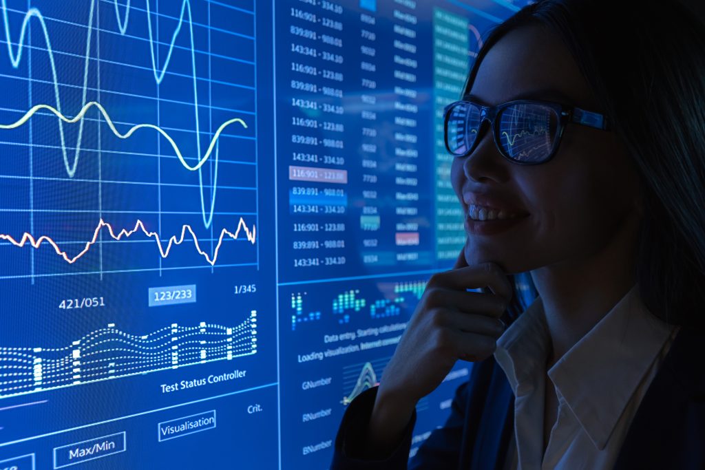 The business lady works with blue monitor