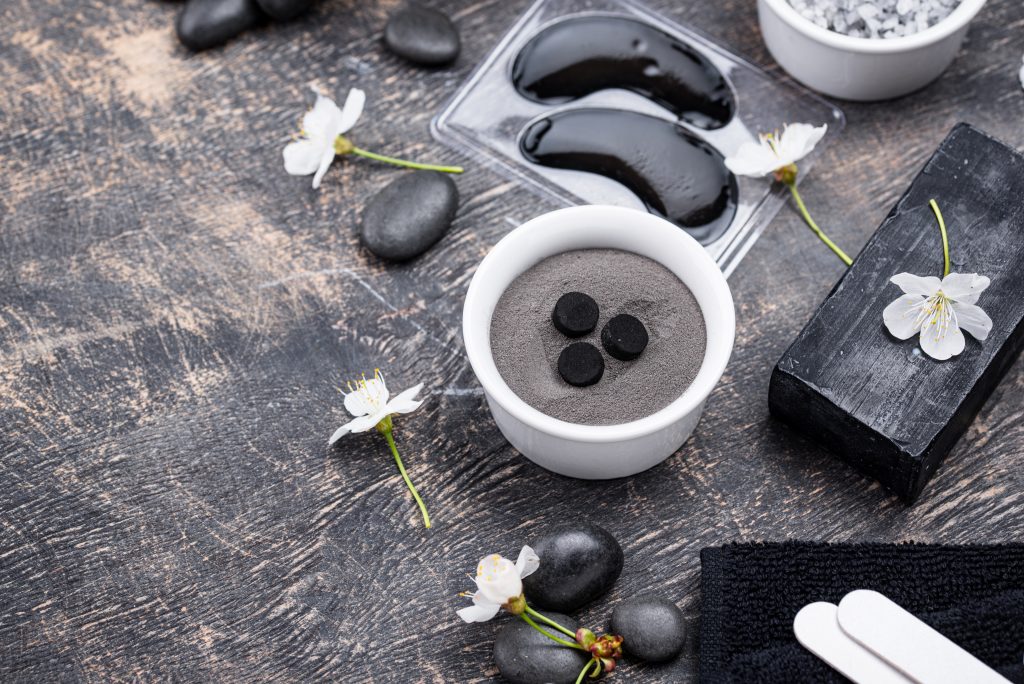 Set of black charcoal detox cosmetics. Skincare concept